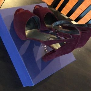 Bordeaux suede platform sandals.